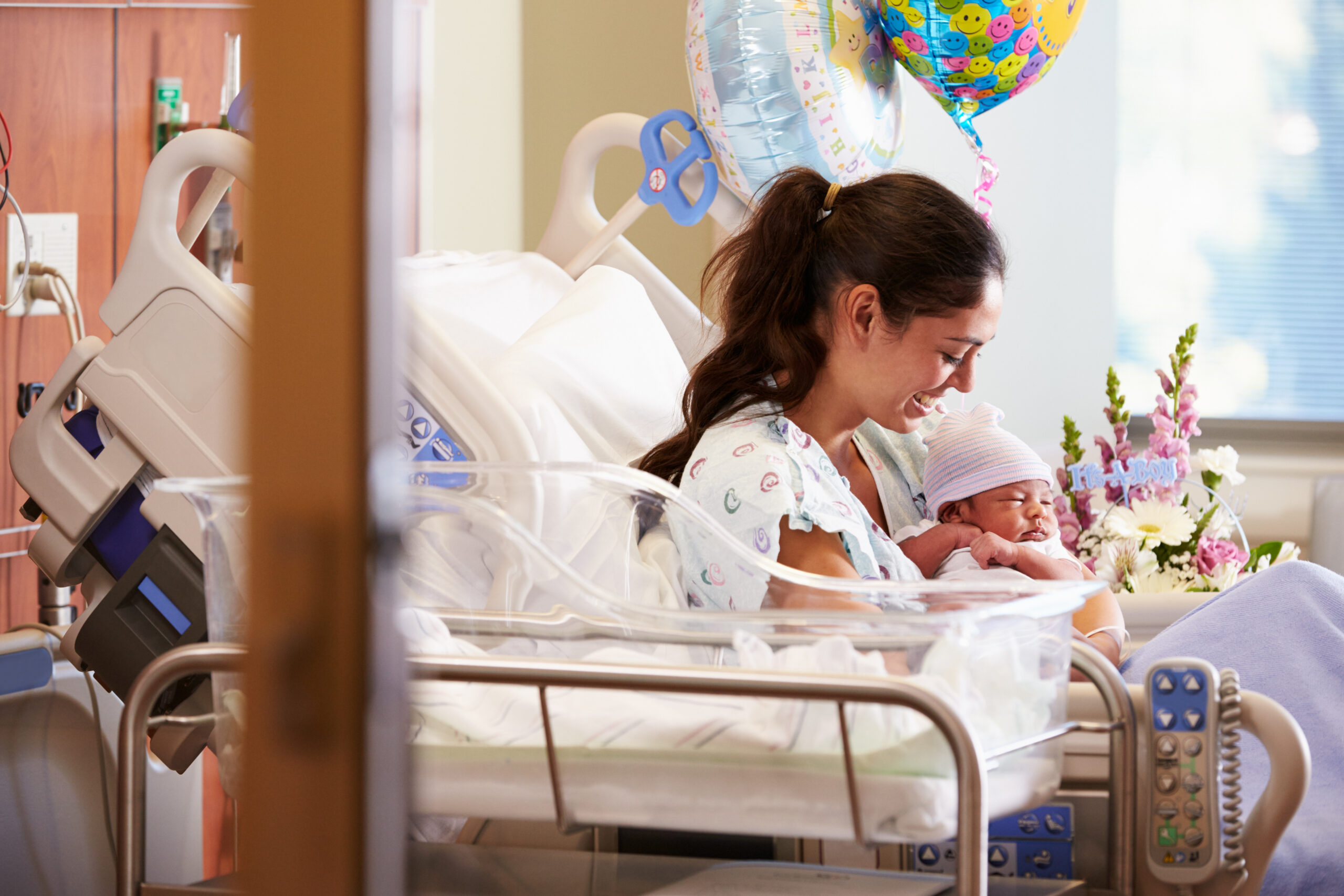 Mother With New Born Baby In Post Natal Department